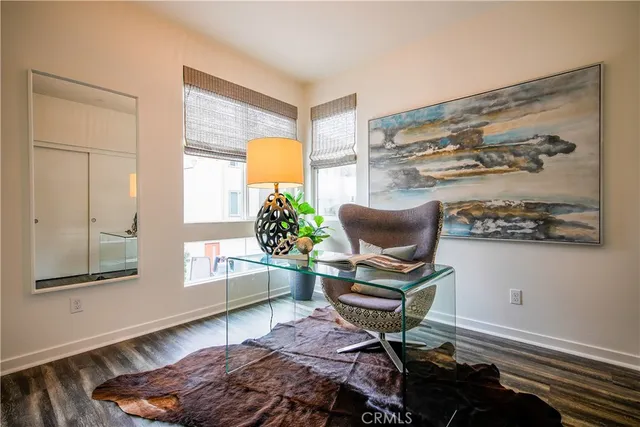 a workspace with furniture and a window