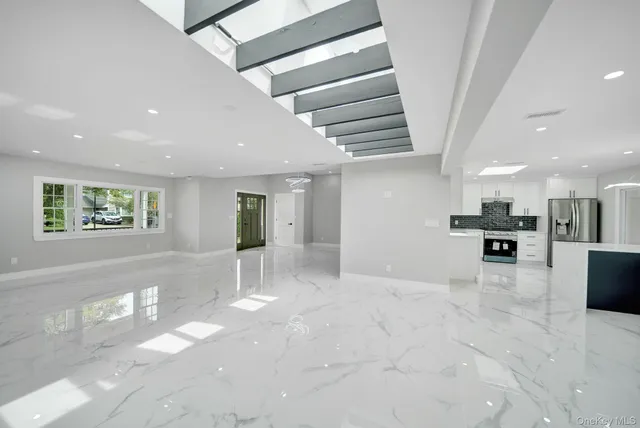 a bathroom with a sink vanity and a mirror