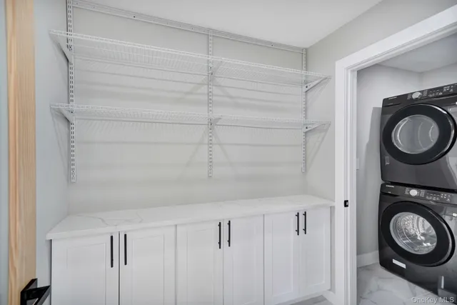 a view of a backyard with plants and a garden