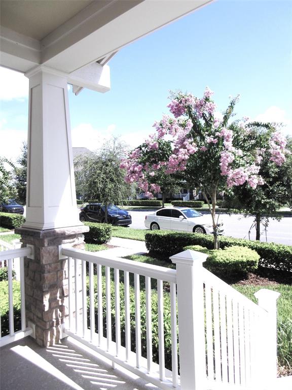 2252 Celebration Boulevard Celebration, FL 34747 - Photo 2 of 40 a front view of a house with a garden