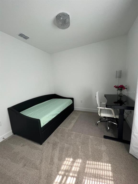 2252 Celebration Boulevard Celebration, FL 34747 - Photo 27 of 40 a living room with furniture