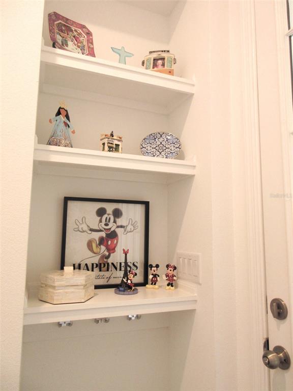 2252 Celebration Boulevard Celebration, FL 34747 - Photo 30 of 40 a bathroom with a sink and a mirror