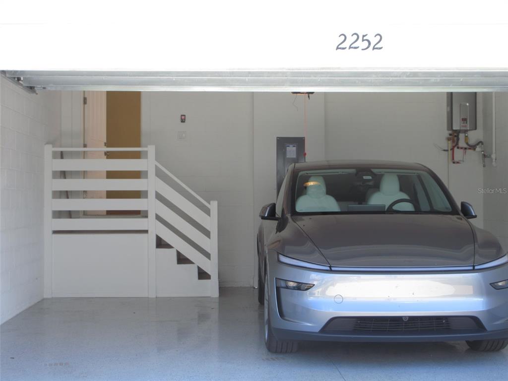 2252 Celebration Boulevard Celebration, FL 34747 - Photo 36 of 40 a bathroom with a sink and washing machine