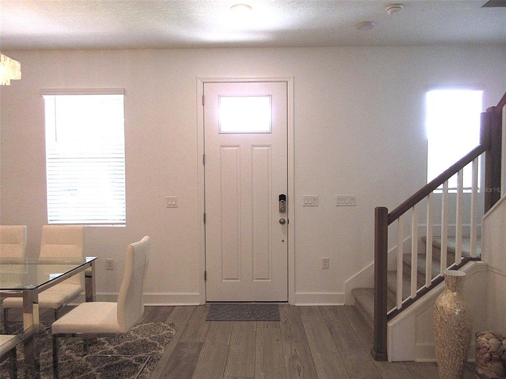 2252 Celebration Boulevard Celebration, FL 34747 - Photo 4 of 40 a view of a hallway with a window