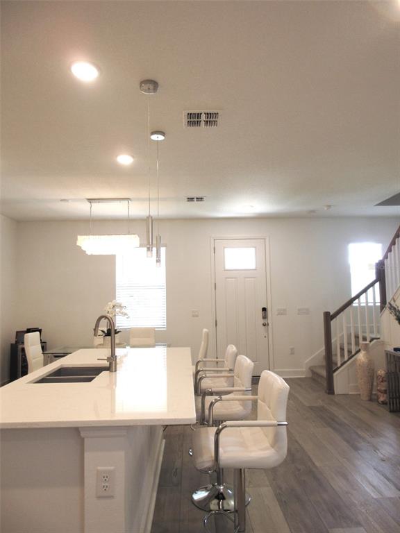 2252 Celebration Boulevard Celebration, FL 34747 - Photo 6 of 40 a living room with furniture and a wooden floor