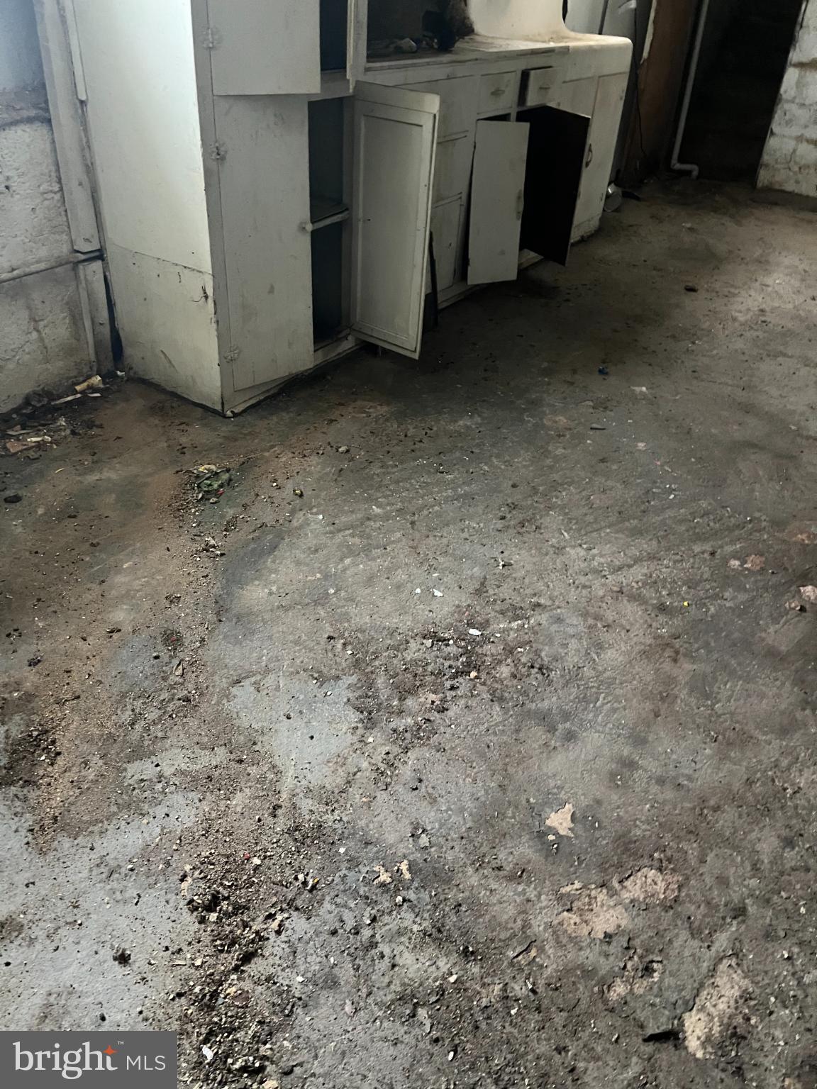 3601 9th Street Baltimore, MD 21225 - Photo 23 of 24 a view of a refrigerator and a sink