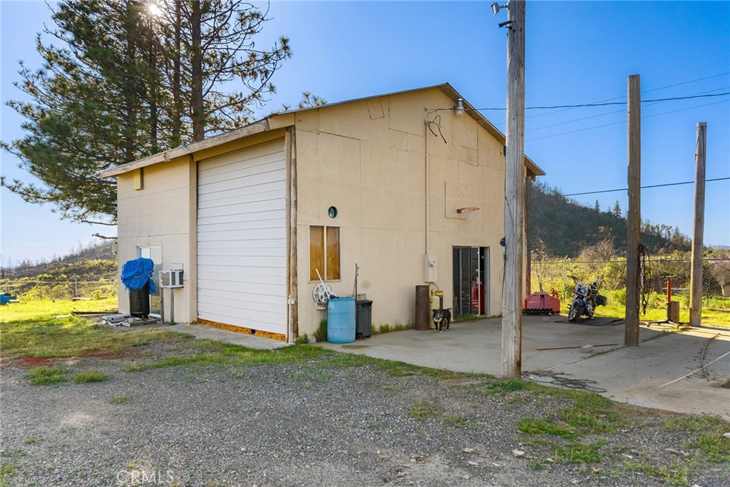 2114 Lumpkin Road Oroville, CA 95966 - Photo 21 of 25 a view of a house with backyard and sitting area