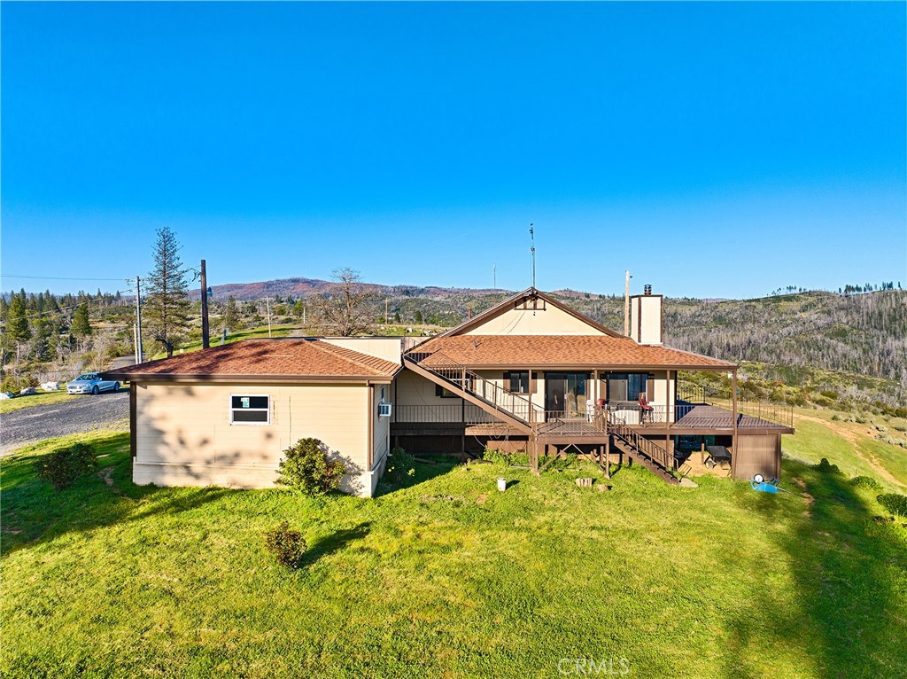 2114 Lumpkin Road Oroville, CA 95966 - Photo 4 of 25 a view of a house with a yard and sitting area