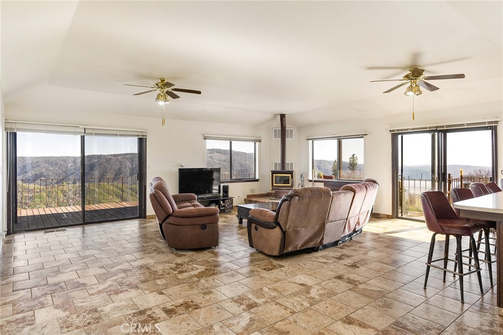 2114 Lumpkin Road Oroville, CA 95966 - Photo 7 of 25 a living room with furniture and a large window