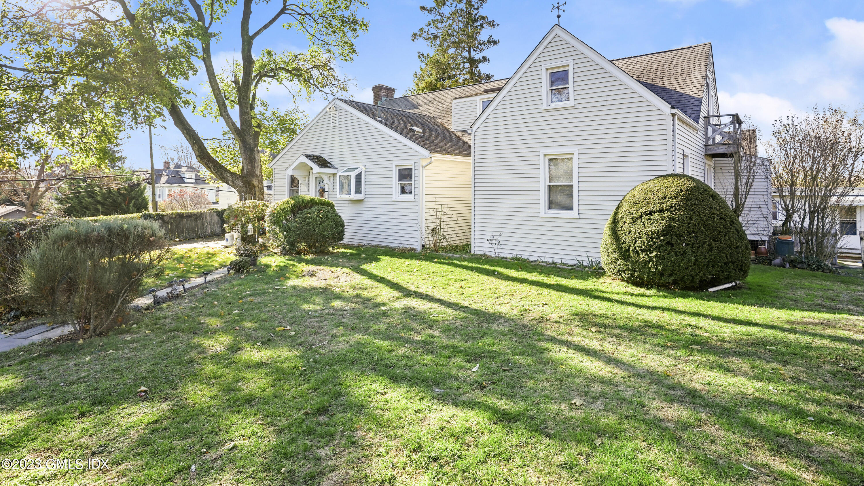 109 Byram Road Greenwich, CT 06830 - Photo 4 of 4 a view of a house with backyard