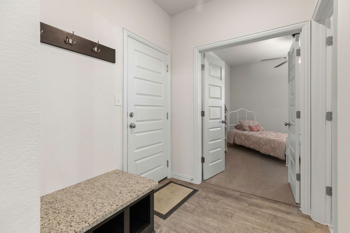 232 Silver Pass Kyle, TX 78640 - Photo 26 of 39 Thoughtfully designed drop zone space. A Functional flow from garage in