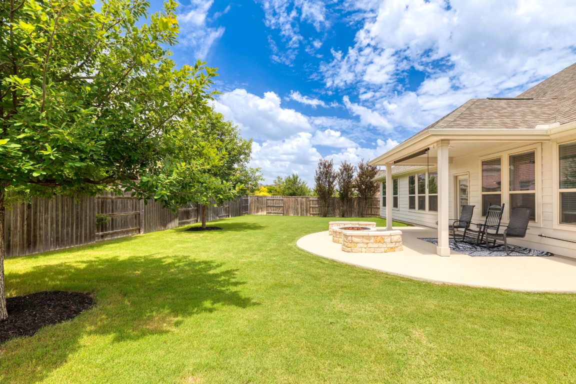 232 Silver Pass Kyle, TX 78640 - Photo 3 of 39 A peaceful outdoor space with room to run and grow plus plenty of shade for comfort all year long.