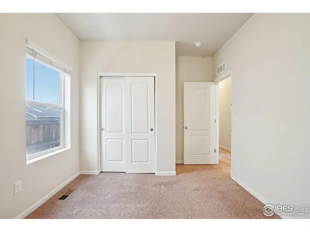 a view of an empty room with window