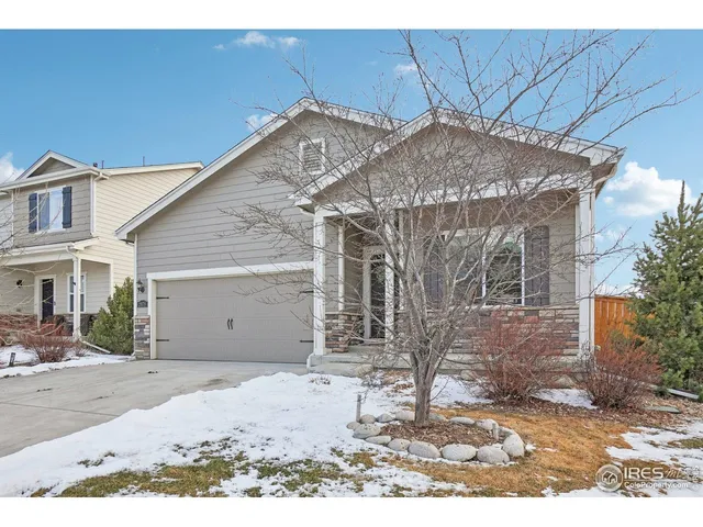 a view of a house with a snow