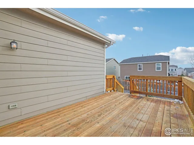 a view of backyard with wooden floor