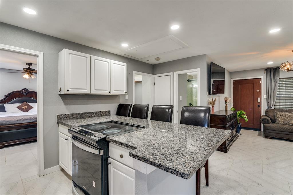 650 Pleasant Oaks Drive Dallas, TX 75217 - Photo 25 of 25 a kitchen with granite countertop lots of counter top space