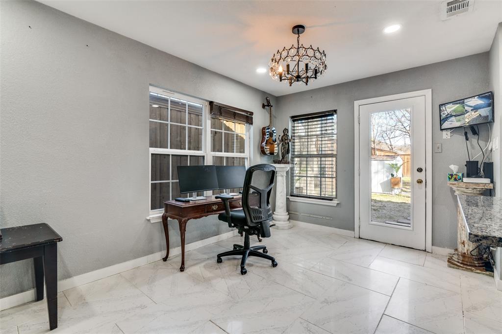 650 Pleasant Oaks Drive Dallas, TX 75217 - Photo 10 of 25 a view of a workspace with furniture and a window