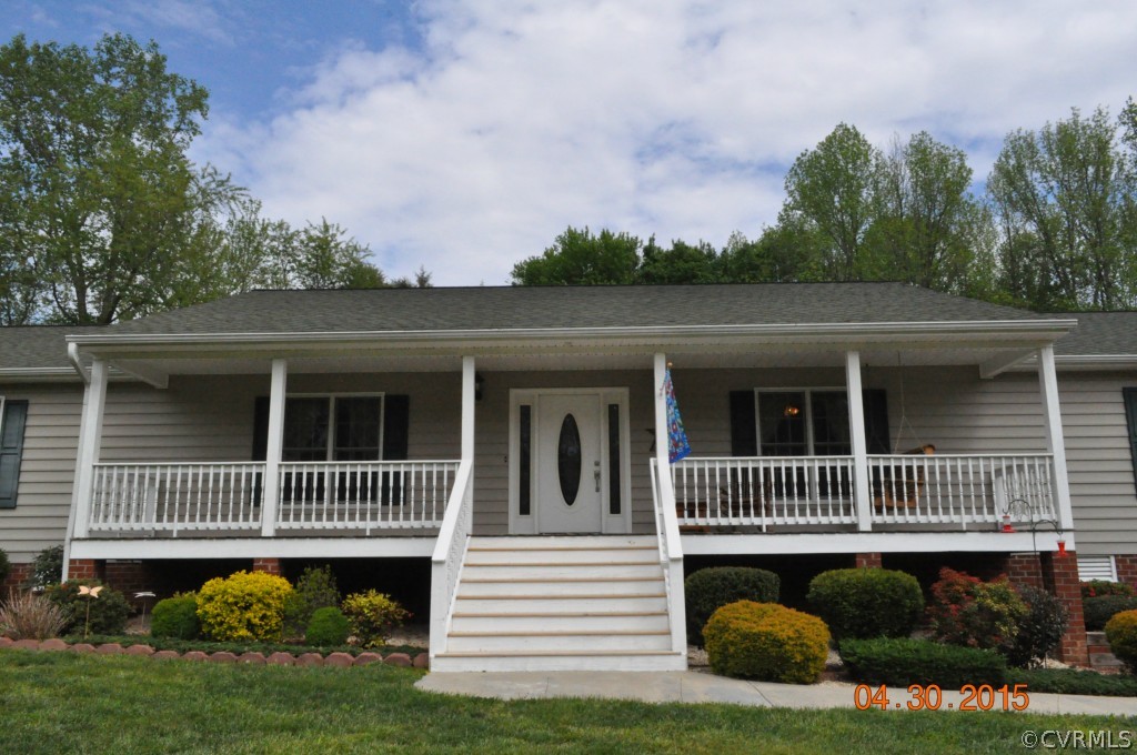 18500 Woodsons Mill Road Beaverdam, VA 23015 - Photo 17 of 24 Covered front porch (porch swing does not convey)