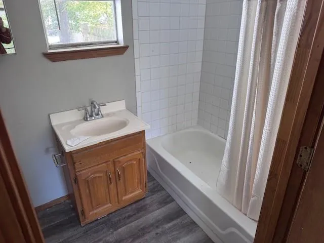 a bathroom with a sink and a bathtub