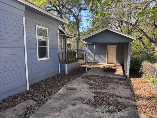 a house view with a backyard space