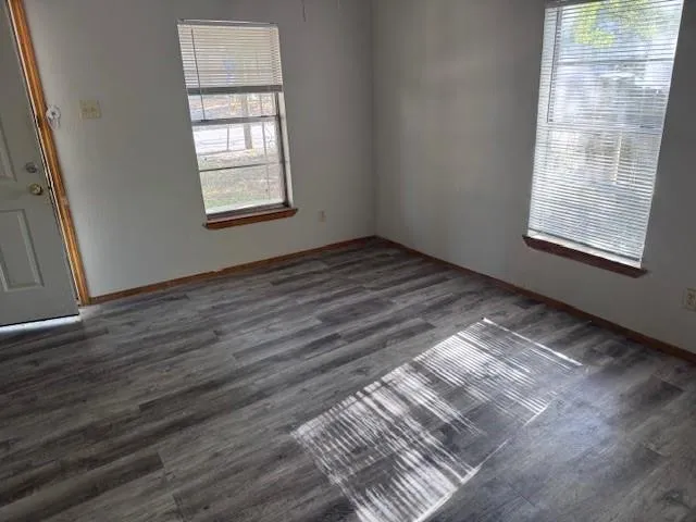 a view of an empty room and window