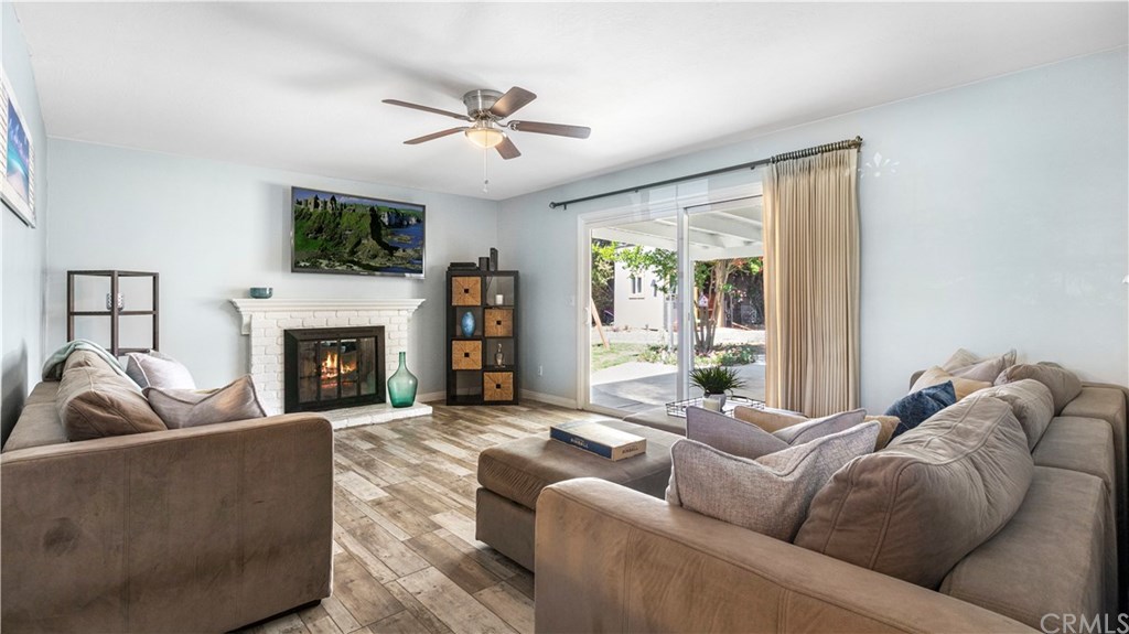 23891 Silverbay Drive Lake Forest, CA 92630 - Photo 11 of 31 Wonderful family room with wood burning fireplace!