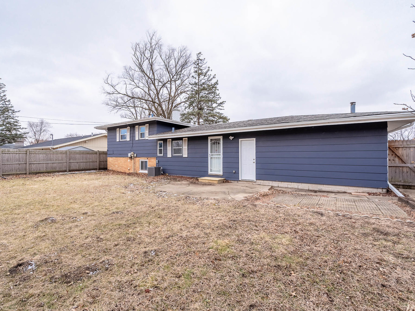 18331 Hickory Street Lansing, IL 60438 - Photo 11 of 12 a house view with a backyard space