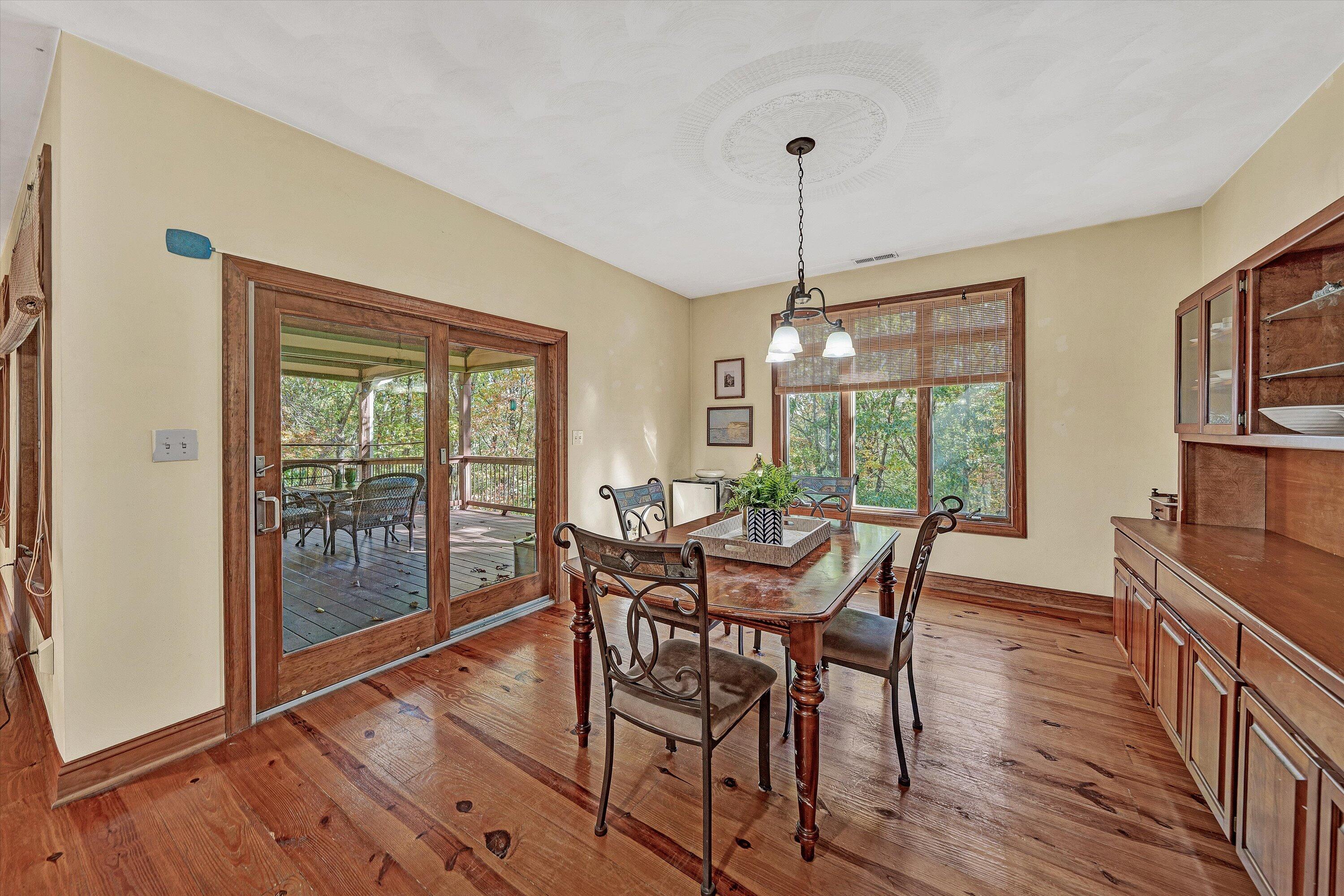 30 Boulder Point Drive Hardy, VA 24101 - Photo 16 of 68 a dining room with furniture window wooden floor