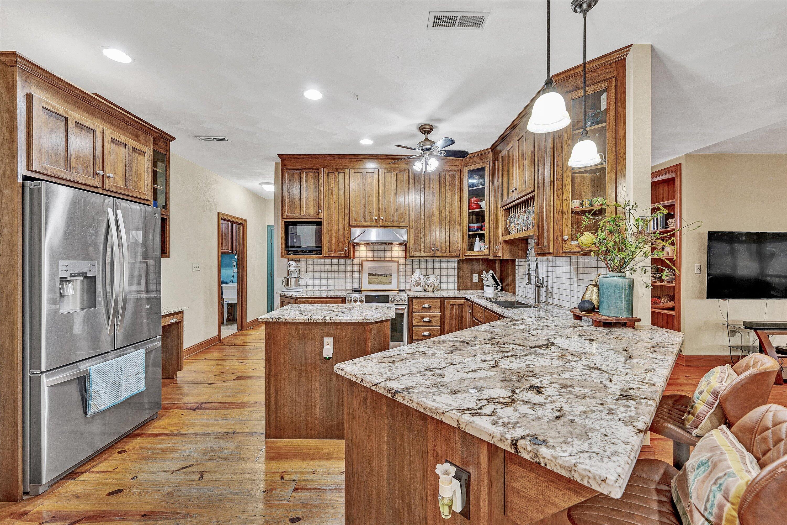 30 Boulder Point Drive Hardy, VA 24101 - Photo 21 of 68 a kitchen with stainless steel appliances granite countertop a sink refrigerator and cabinets