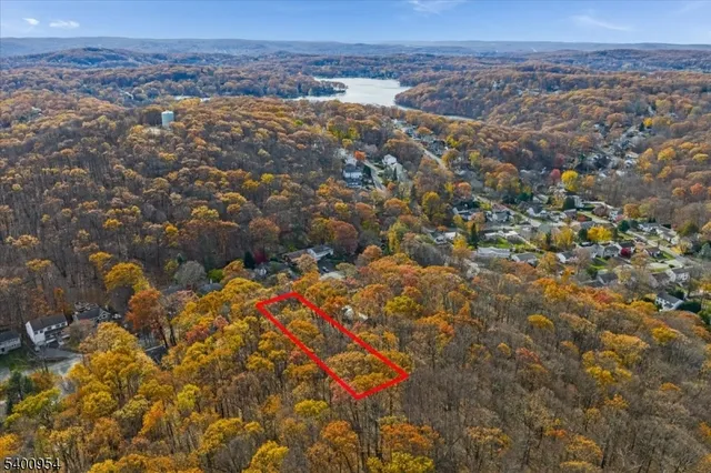 an aerial view of houses with yard