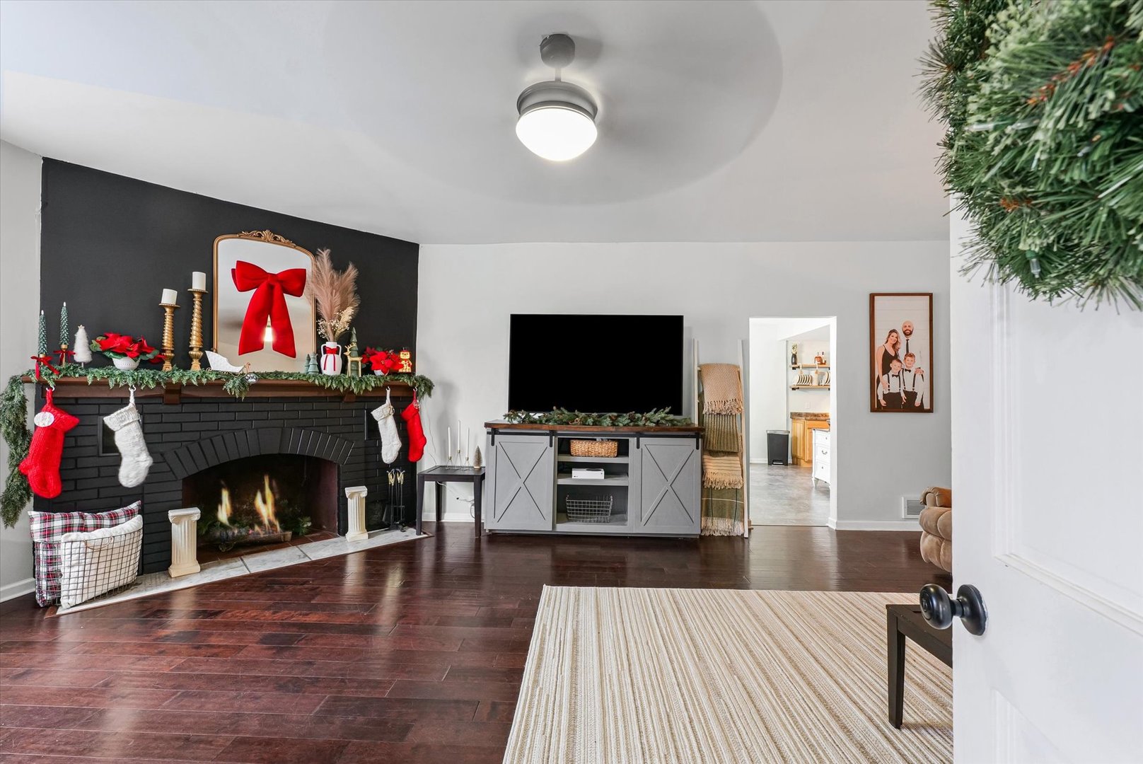 113 Witt Park Road Sidney, IL 61877 - Photo 6 of 29 a living room with furniture and a fireplace or television