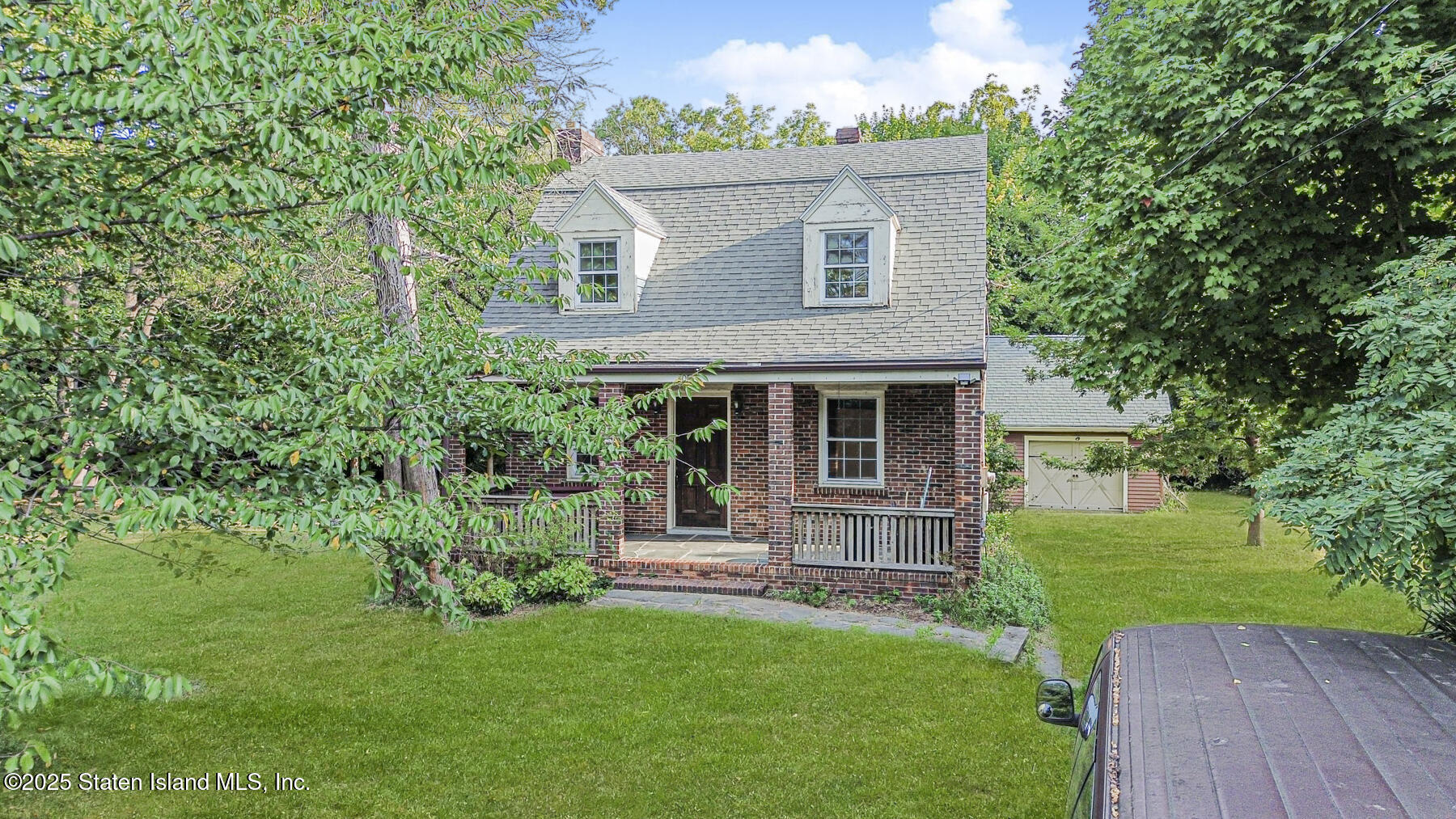 777-805 Willowbrook Road Staten Island, NY 10314 - Photo 6 of 12 front view of a house with a yard
