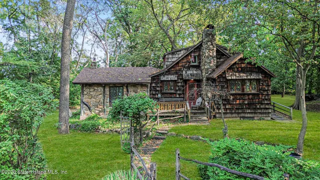 a view of a park with large trees
