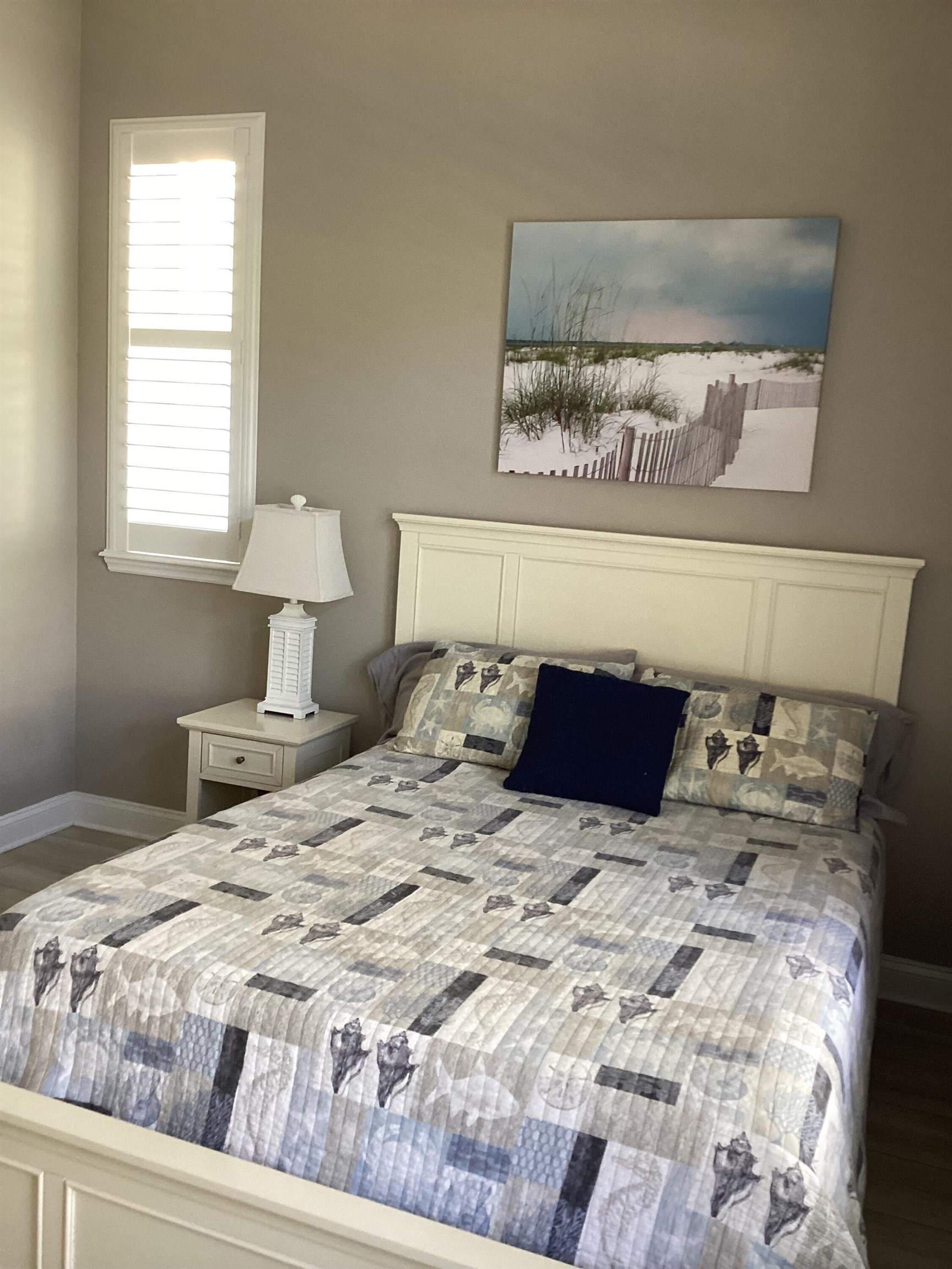 776 Ocean Palm Way St. Augustine, FL 32080 - Photo 16 of 38 a bedroom with a large bed and a window