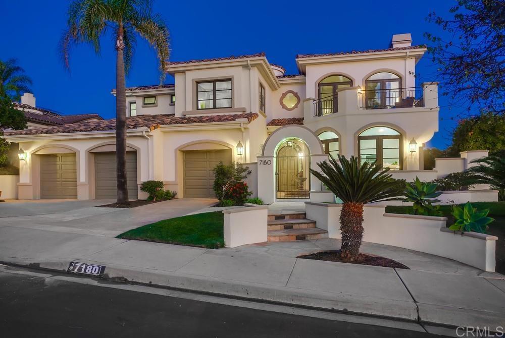 7180 Aviara Drive Carlsbad, CA 92011 - Photo 1 of 43 a front view of a house with garden