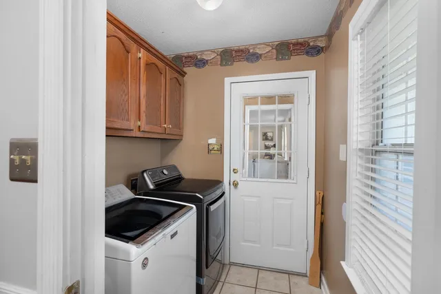 a view of a house with backyard and a slide