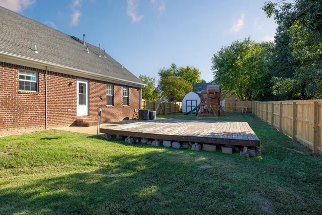 a wooden bench sitting on top of a wooden floor