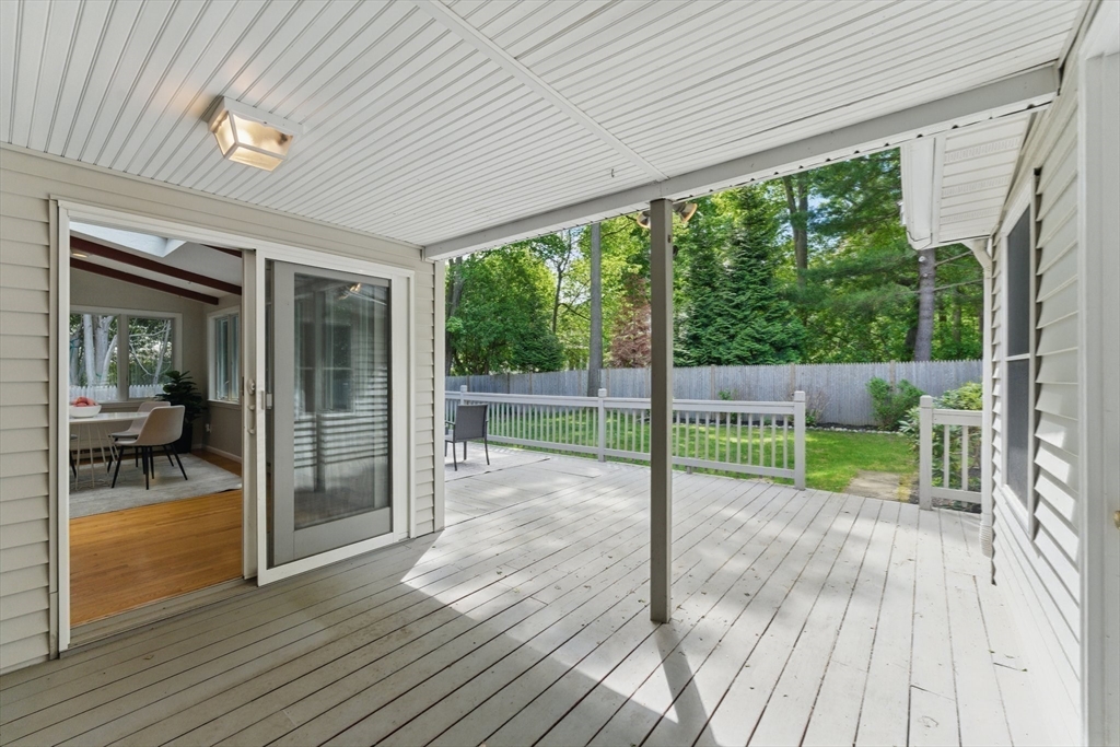 6 Willow Park Wellesley, MA 02481 - Photo 13 of 37 a view of livingroom with floor to ceiling window with wooden floor