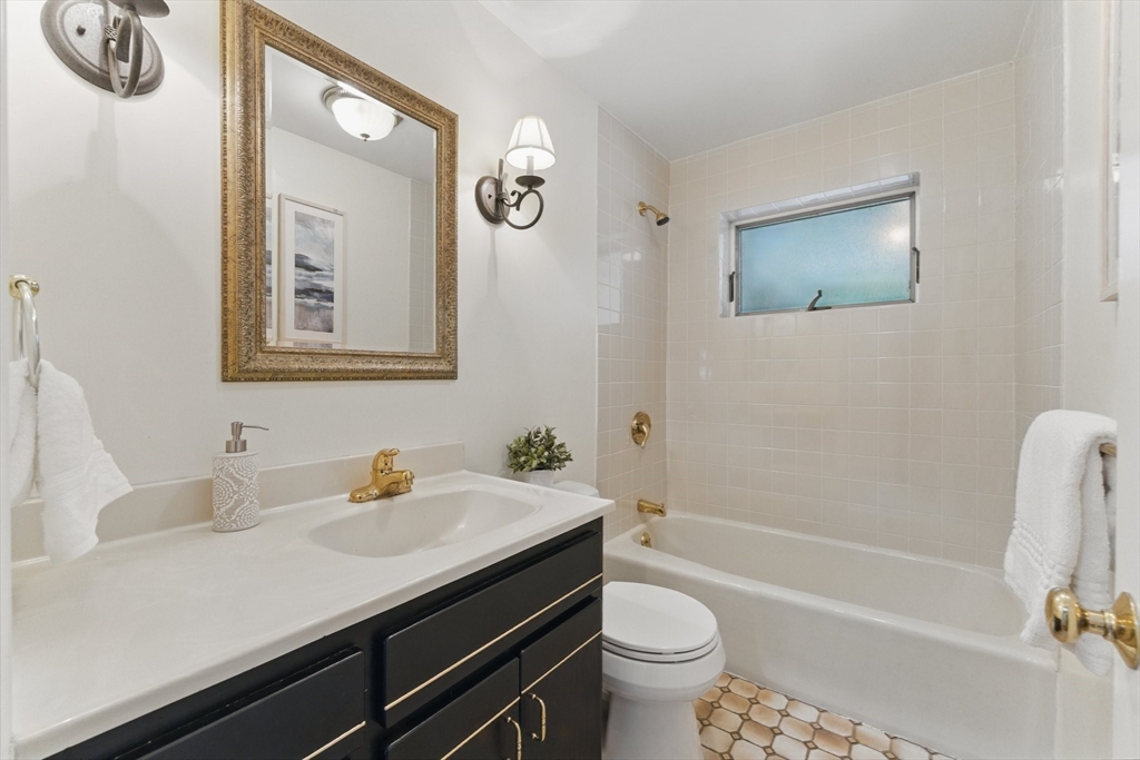 6 Willow Park Wellesley, MA 02481 - Photo 16 of 37 a bathroom with a sink a toilet and bathtub