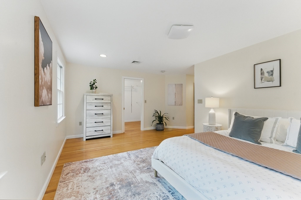 6 Willow Park Wellesley, MA 02481 - Photo 21 of 37 a bedroom with a bed and dresser