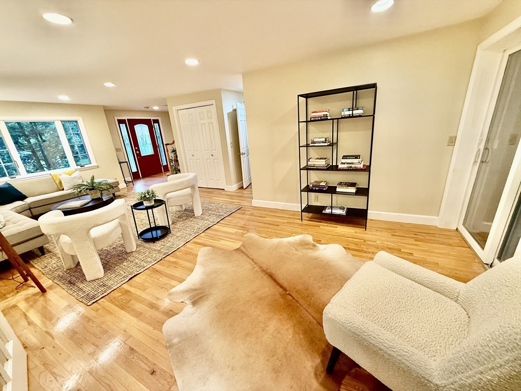 6 Willow Park Wellesley, MA 02481 - Photo 3 of 37 a living room with furniture and a flat screen tv