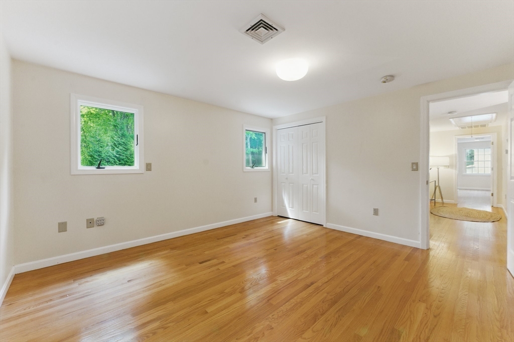 6 Willow Park Wellesley, MA 02481 - Photo 31 of 37 a view of empty room with wooden floor and fan