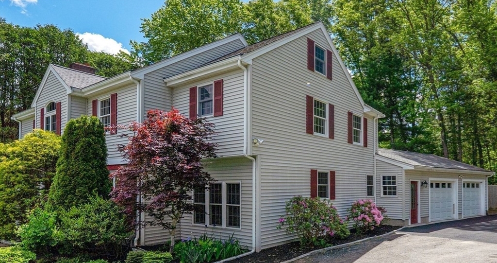 6 Willow Park Wellesley, MA 02481 - Photo 36 of 37 a front view of a house with plants