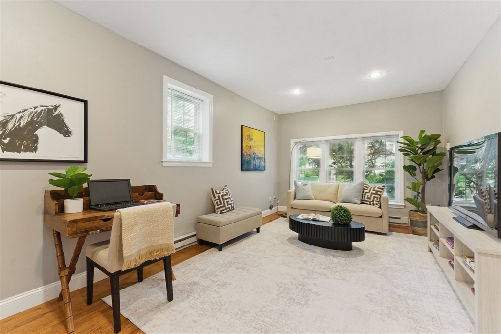 6 Willow Park Wellesley, MA 02481 - Photo 6 of 37 a living room with furniture and a flat screen tv