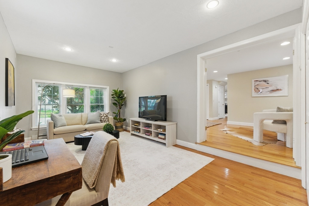 6 Willow Park Wellesley, MA 02481 - Photo 7 of 37 a living room with furniture and a flat screen tv