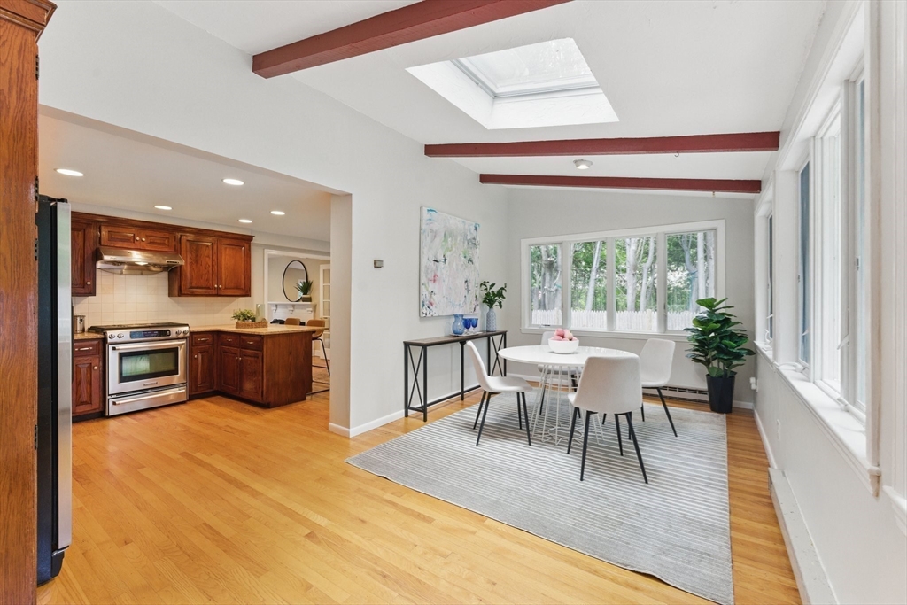 6 Willow Park Wellesley, MA 02481 - Photo 10 of 37 a view of a dining room with furniture and wooden floor