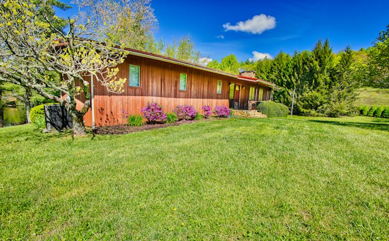 1436 Mayberry Church Road Meadows Of Dan, VA 24120 - Photo 30 of 38 a front view of house with yard and green space