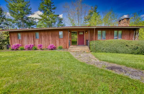a front view of house with yard