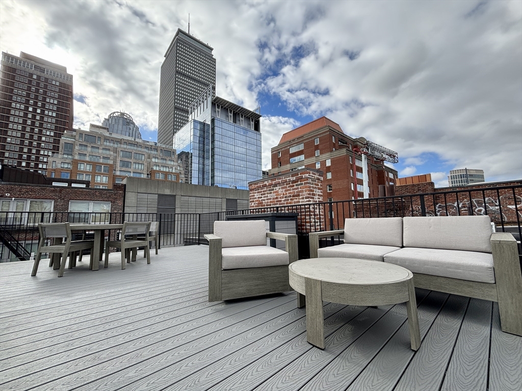 246 Newbury Street, Unit PH Boston, MA 02116 - Photo 1 of 22 a terrace view with seating space