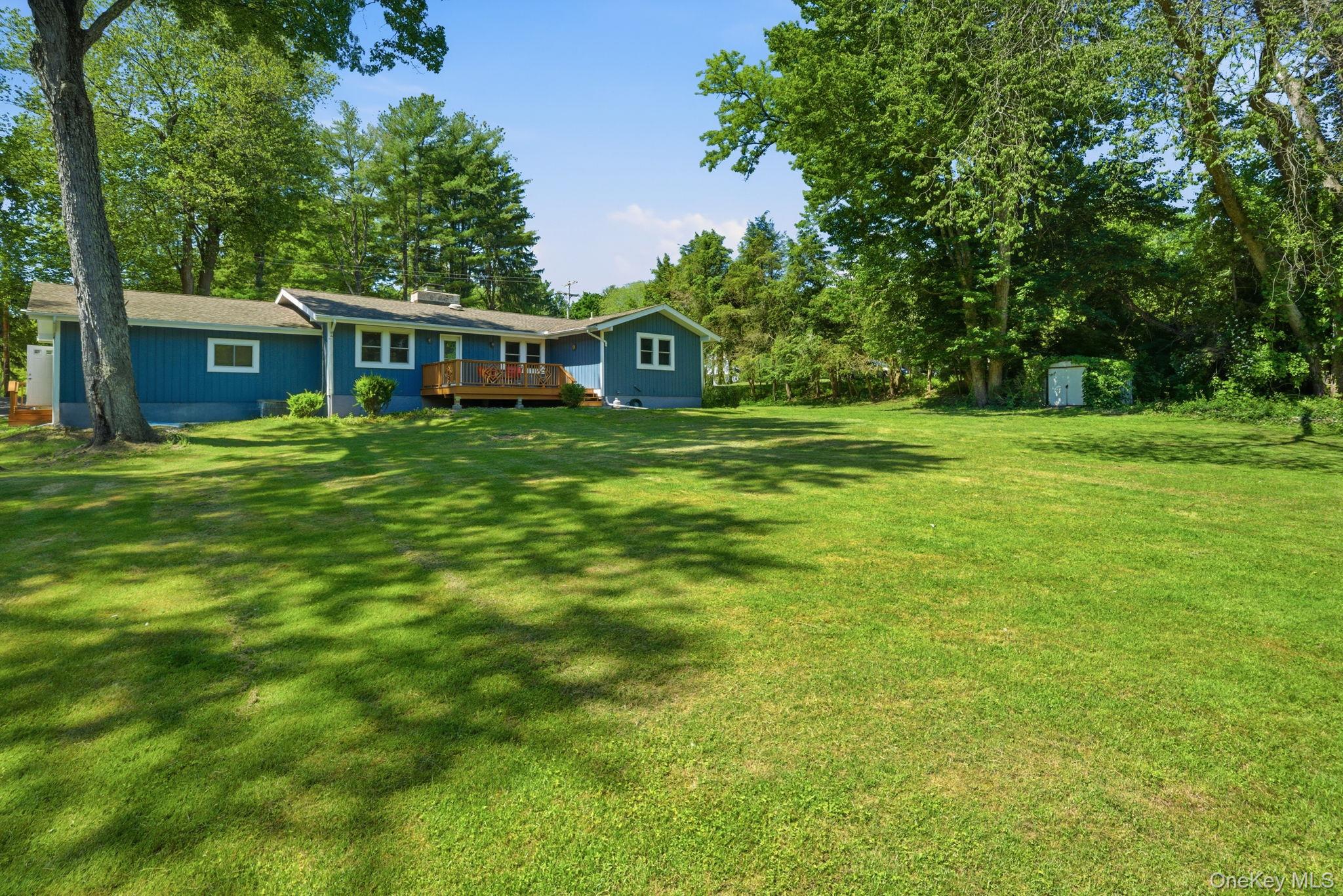 35 Deans Bridge Road Somers, NY 10589 - Photo 33 of 49 The yard opens up wide and flat, with a tucked-in storage shed and plenty of green for a garden, a game of catch, or whatever summer calls for.